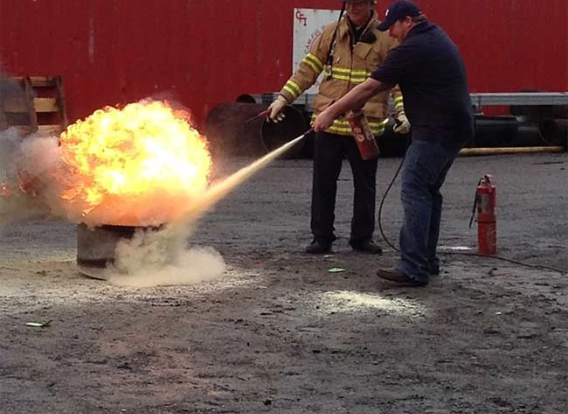 firefighters educating children on fire safety